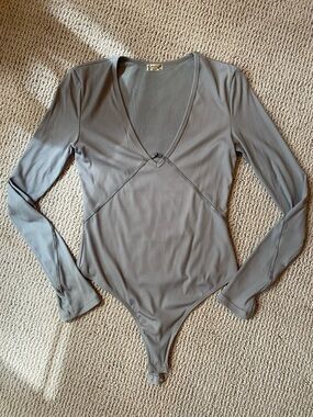 Free People Long Sleeve V-Neck Ribbed Bodysuit in Gray